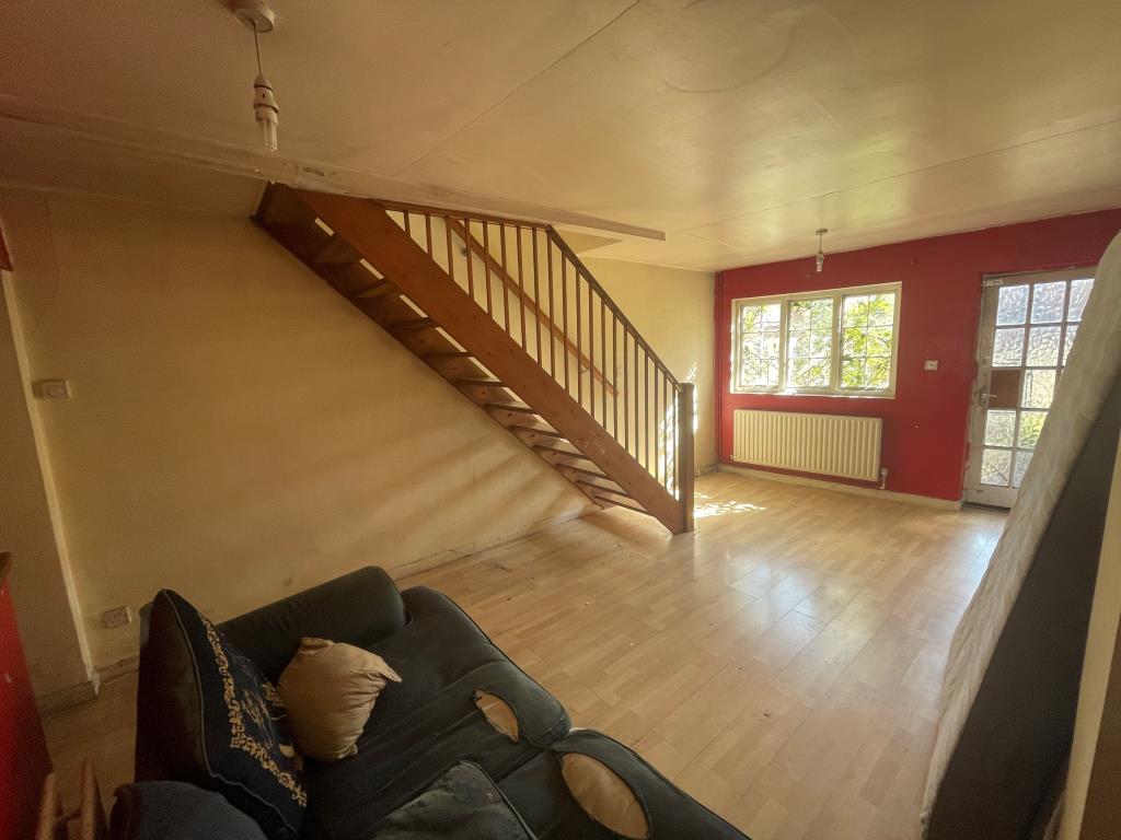 Lot: 46 - TWO-BEDROOM END-TERRACE IN GOOD LOCATION - Living room with stairs